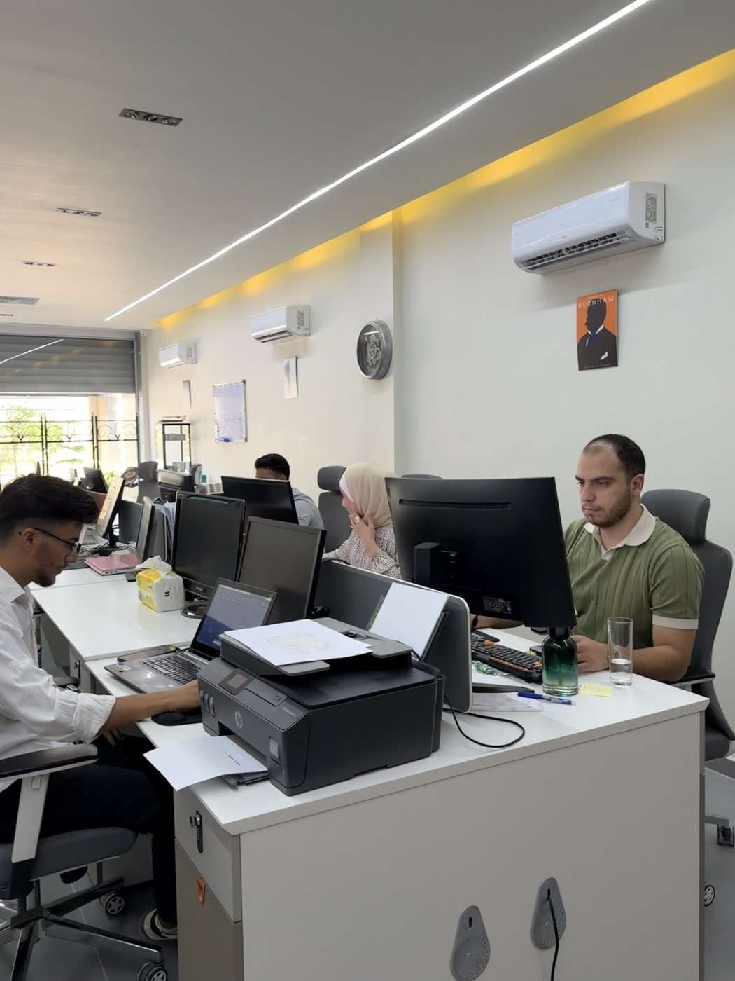 Architects and engineers working at their stations inside LINE studio